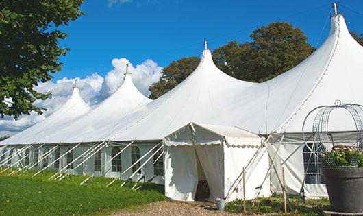 a line of sleek and modern portable restrooms ready for use at an upscale corporate event in Boxford MA